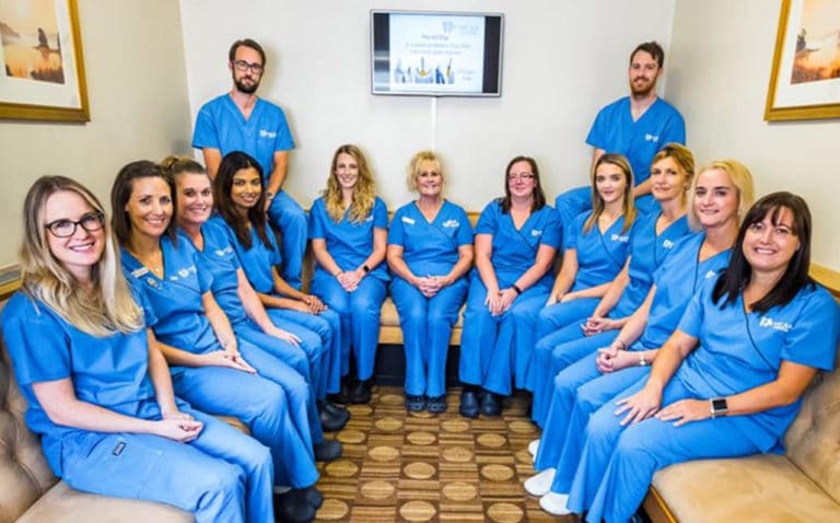 Bethcar Dental Team posing happy after a successful Dental Practice Marketing campaign